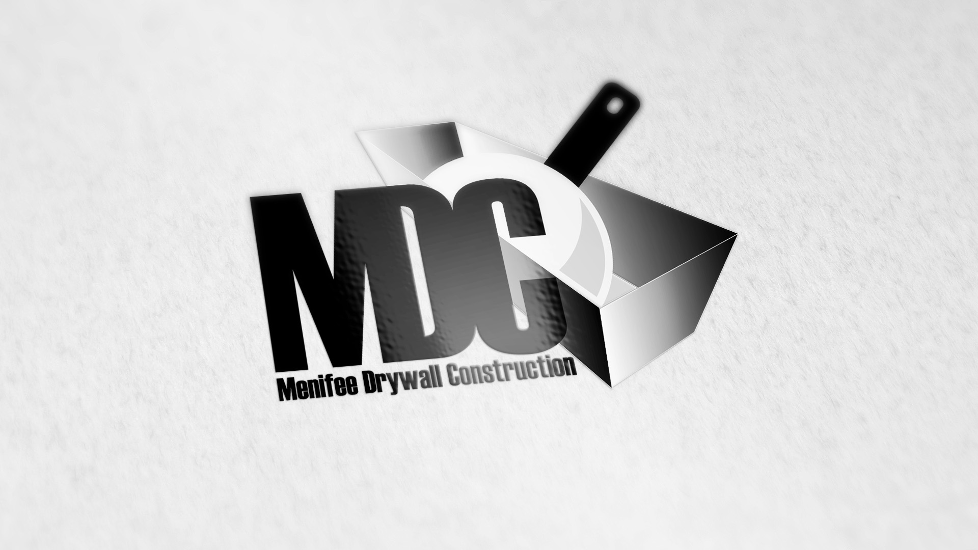 Large MDC glossy logo on white cardstock.